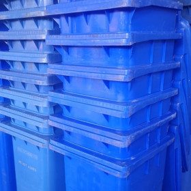 Stacks of blue bins