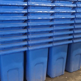 Stacks of blue bins